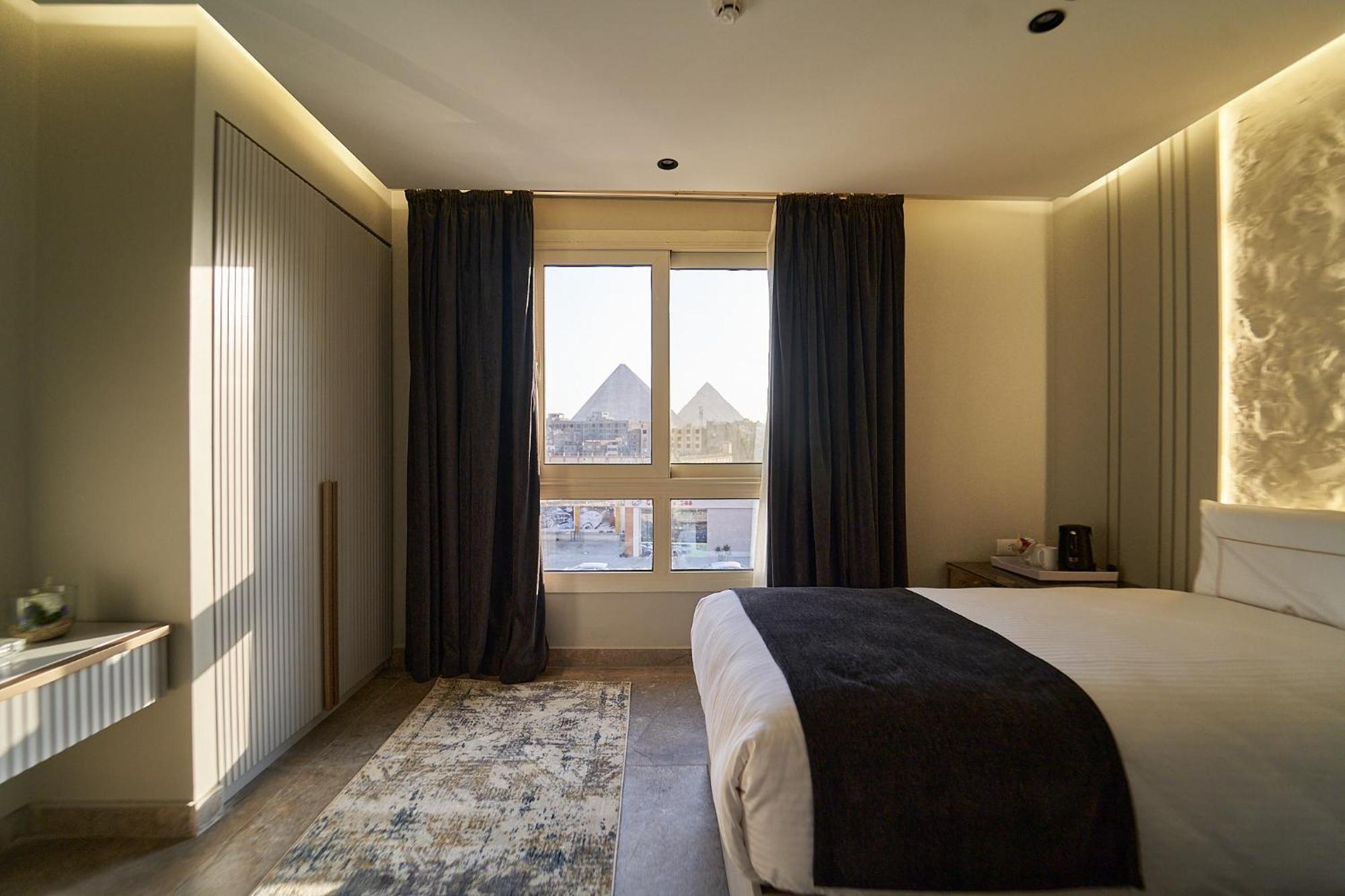 Pyramids Charm Hotel Al Kawm al Akhdar エクステリア 写真