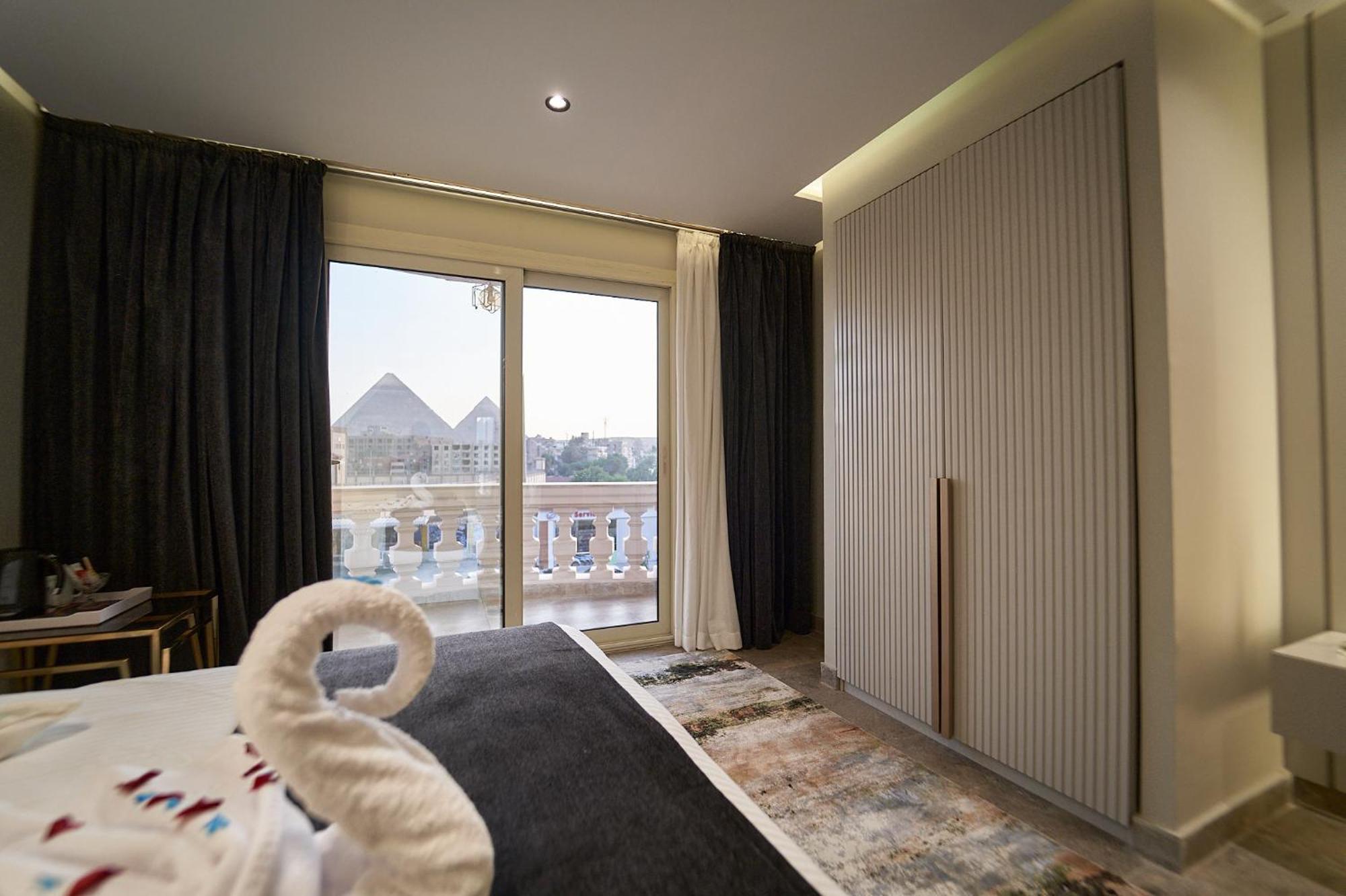 Pyramids Charm Hotel Al Kawm al Akhdar エクステリア 写真