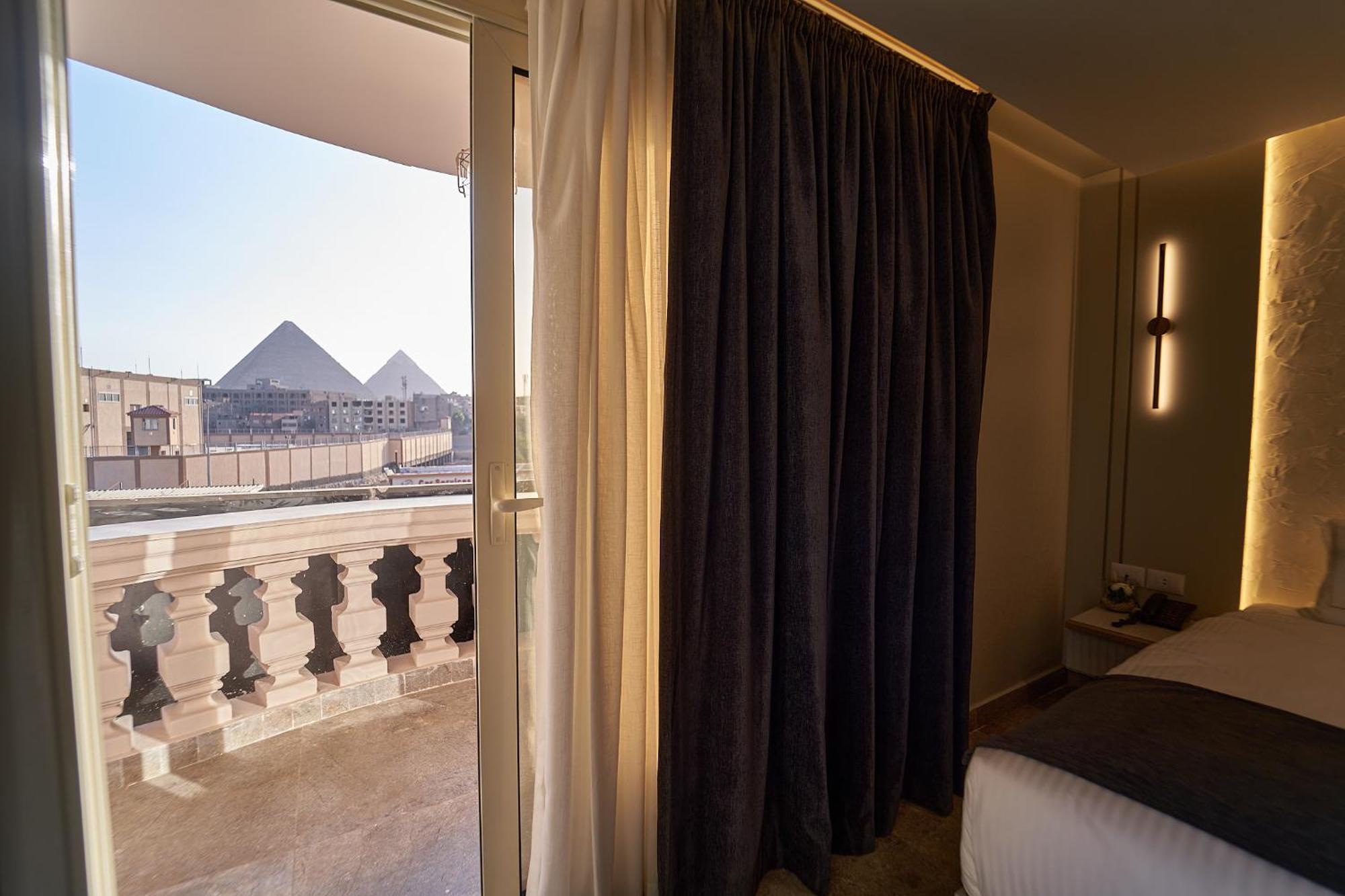 Pyramids Charm Hotel Al Kawm al Akhdar エクステリア 写真