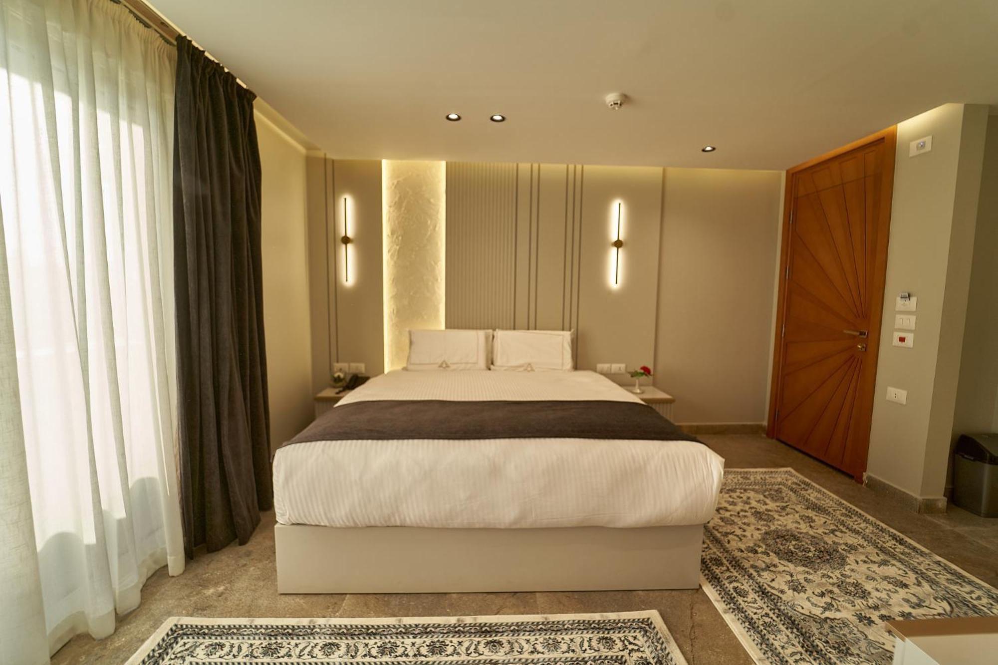 Pyramids Charm Hotel Al Kawm al Akhdar エクステリア 写真