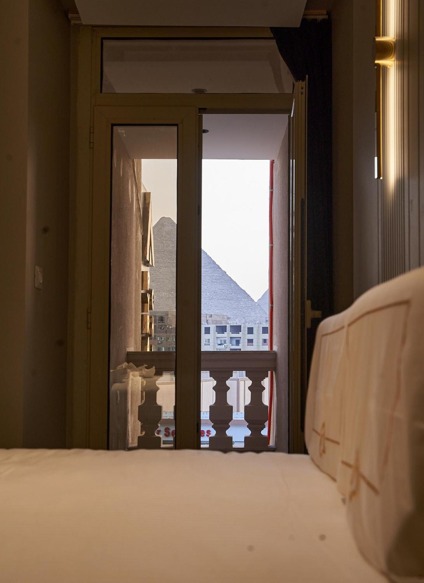 Pyramids Charm Hotel Al Kawm al Akhdar エクステリア 写真