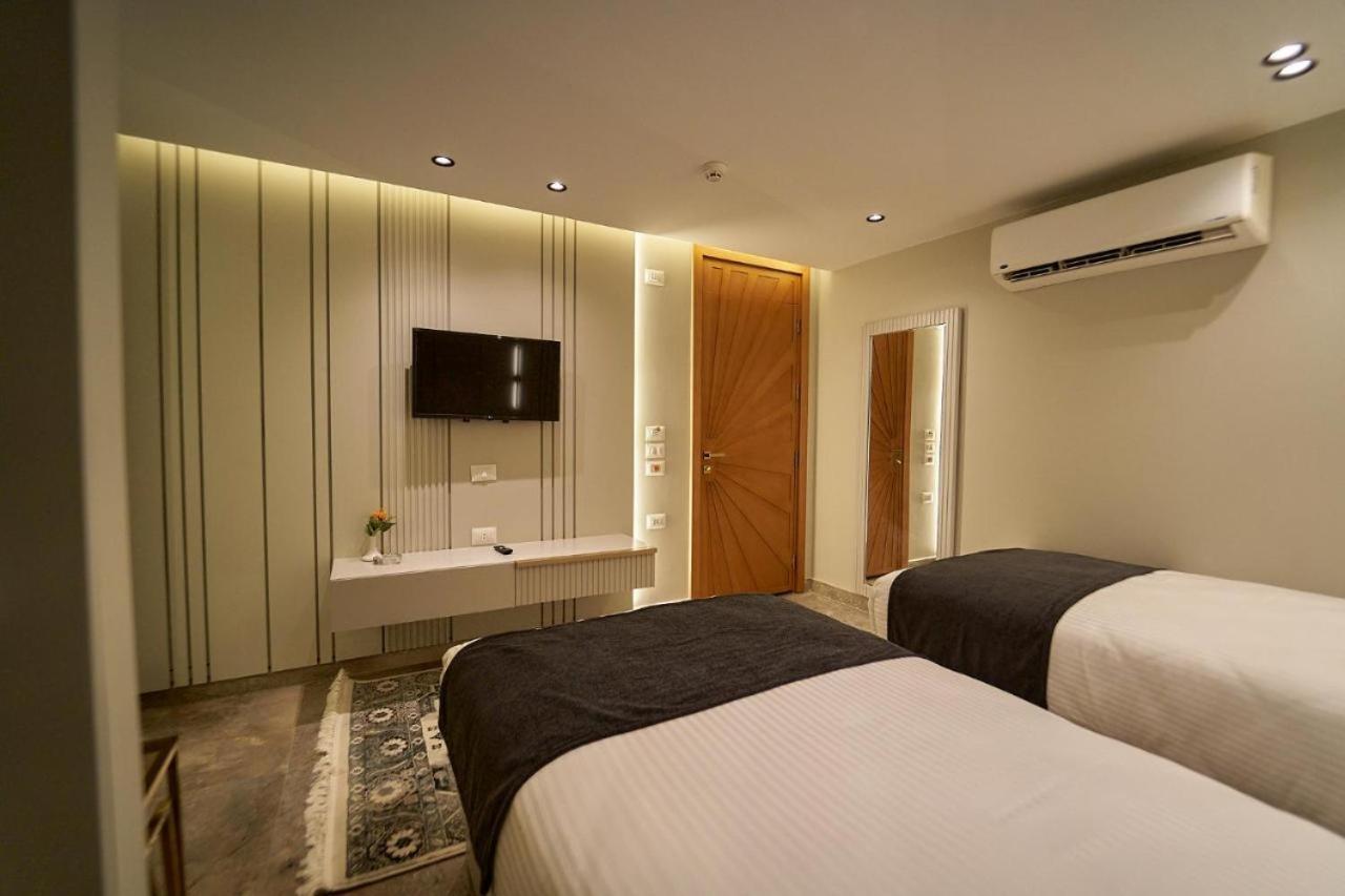 Pyramids Charm Hotel Al Kawm al Akhdar エクステリア 写真